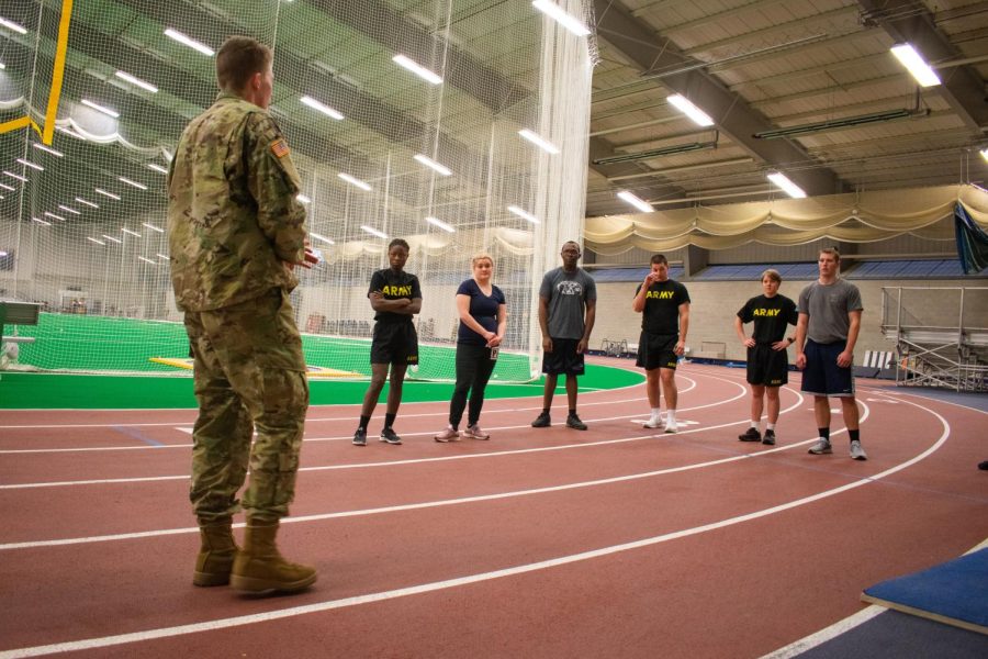 Cadet Jared Howard talks to other cadets in the KSU field house on February 20.
