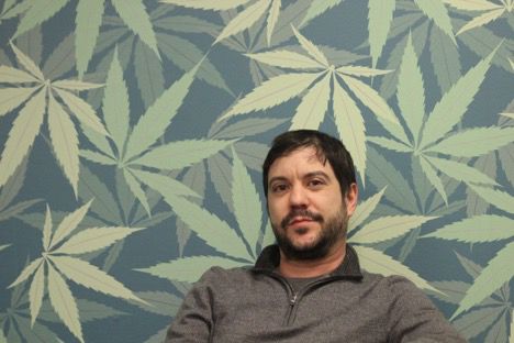 Jake Richardson, the lead marketing manager at Ohio Marijuana Card, poses for a photo at the Cleveland office on Monday, Jan. 28, 2019.