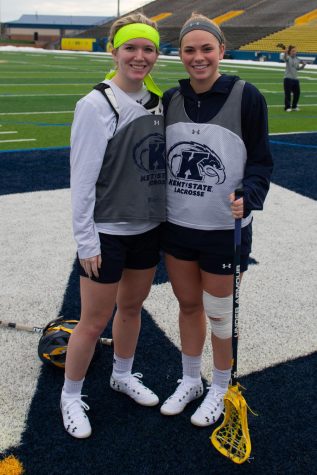 Grace Merrill and Megan Kozar pose for a picture after lacrosse practice on February 4.
