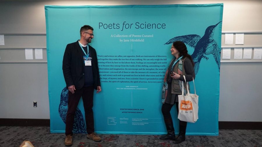 David Hassler, the director of Wick Poetry Center, and Jane Hirshfield, a famous poet, converse at the 2019 Association of Writers and Writing Programs (AWP) Conference in Portland, Oregon, Thursday, March 28, 2019. 