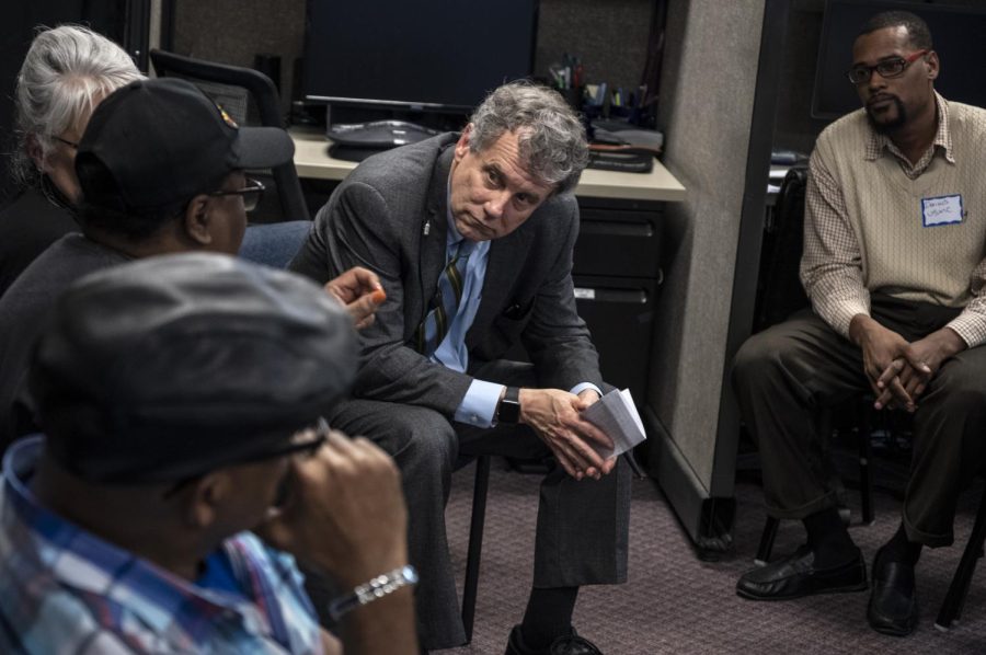 Sen. Sherrod Brown listens as people share their experiences as workers and veterans during a stop in Florence, South Carolina, on his Dignity of Work tour March 1, 2019.
