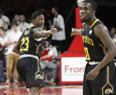 Jaylin Walker points to Jalen Avery after making a 3-pointer in the first-half of Kent States game against Miami (OH) on March 5, 2019. Walker finished with 29 points.