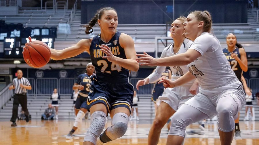 Alexa Golden drives past Butler's Kristen Spolyar in the second half of Kent State's WNIT Second Round matchup. Golden scored 11 points in her final game for Kent State. March 23, 2019.