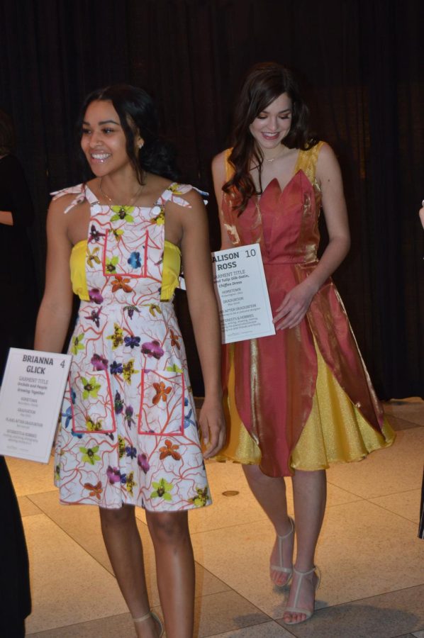 Models wearing Brianna Glick’s and Alison Ross’ orchid-inspired dresses at the Fashion Meets the Botanicals fashion show March 9, 2019.