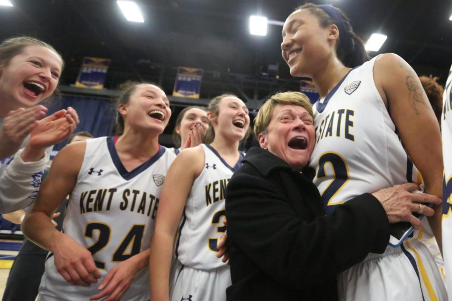 Kent State former president Beverly Warren hugs Merissa Barber-Smith after Kent States 86-62 over the Falcons on March 11 in the first round of the MAC Tournament. 