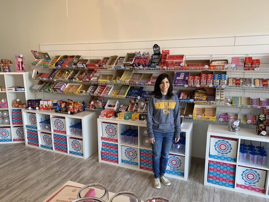 Liz Woods, the owner of Sugar Rush, in her store on East Erie Street on March 20, 2019. 