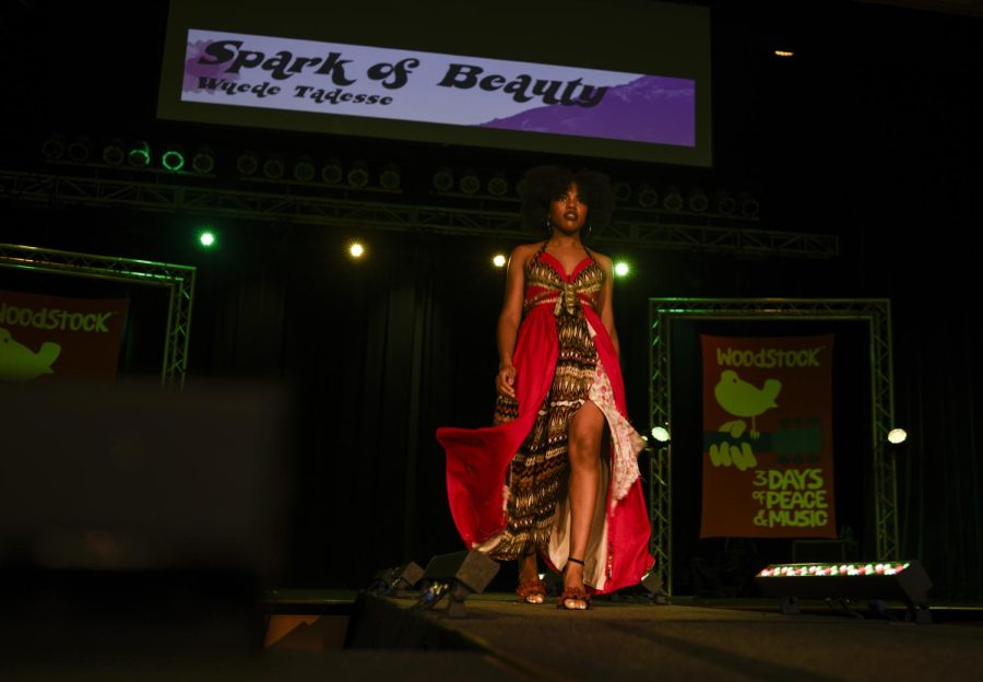 A model wearing a design from Wuede Tadesse’s Spark of Beauty collection walks down the runway druing Rock The Runway on Sunday, March 3, 2019. Wuede Tadesse won first place for her collection.