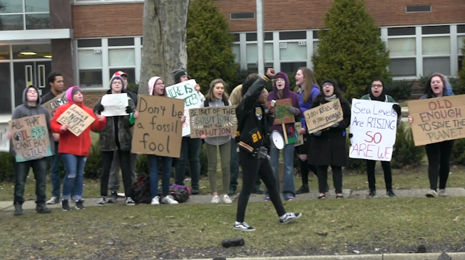 Students at Cuyahoga Falls High School protest on campus during the school day on Friday, March 15. 