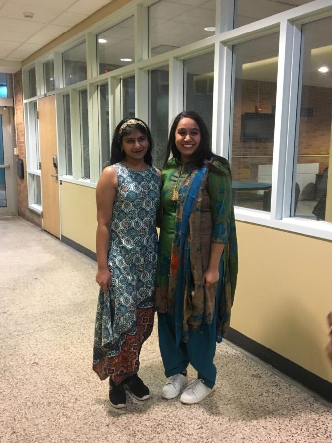 Nitya Mittal (left) and Gurveen Karr (right) pose for a photo. 