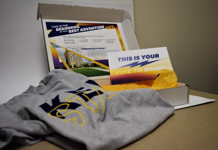 The box Kent State sends out to future Flashes containing a T-shirt, laptop decal and letter from President Beverly Warren. 