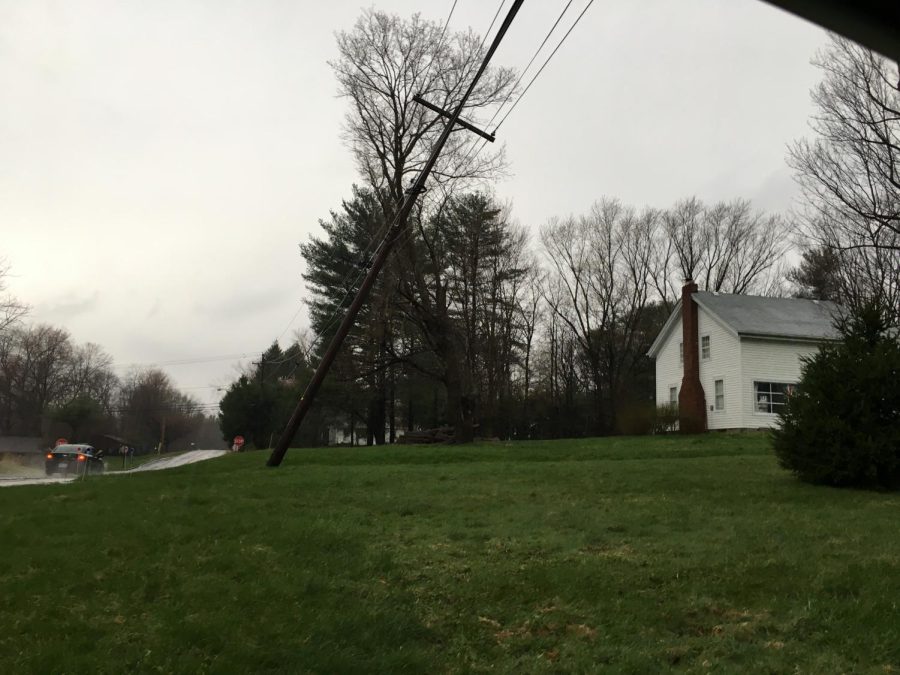 A downed power line in Ravenna on Sunday, April 14, 2019. All of Portage County was speckled with power outages, and numerous roads in Ravenna with littered with debris from tree branches. 