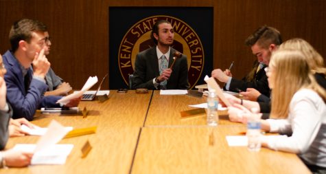 Vala Zeinali (center) directs his first meeting as the new Undergraduate Student Government president on April 24, 2019.
