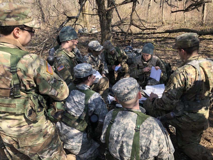 Cadets gather to plan their attacks during their weekend Field Training Exercise. 
