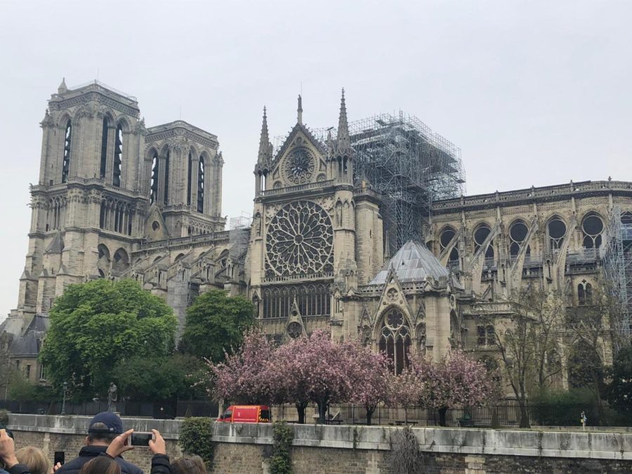 The+damaged+Notre+Dame+cathedral+still+stands+after+a+devastating+fire+from+the+previous+day.