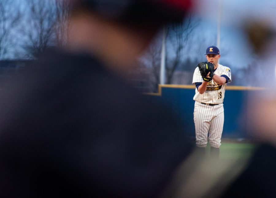 Former pitcher Connor Wollersheim about to pitch, seen through the on-deck batter. Kent State Golden Flashes won 9-5 against East Central Michigan on the April 5, 2019 game.
