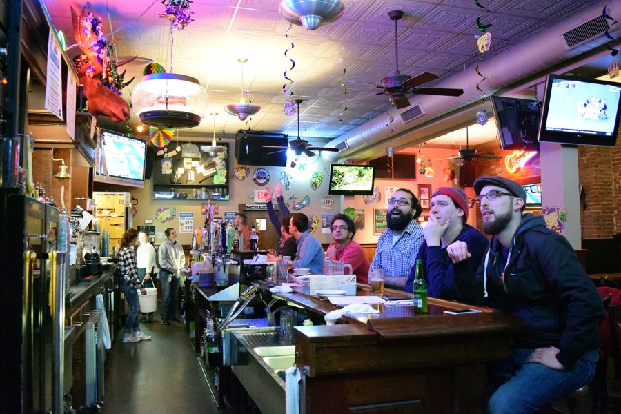 (From left) Bryan Dodd, Kyle Thrasher, and Brenton Pahl watch Super Bowl 50 at Ray’s Place on Sunday, Feb. 7, 2016. FILE.