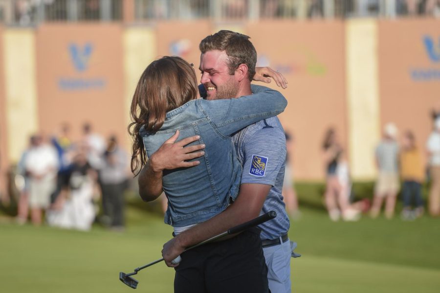 Corey+Conners+hugs+his+wife+after+winning+the+Valero+Texas+Open+on+Sunday+at+the+TPC+San+Antonio+Oaks+Course+in+San+Antonio%2C+Texas.+%28Icon+Sportswire+via+AP+Images%29.