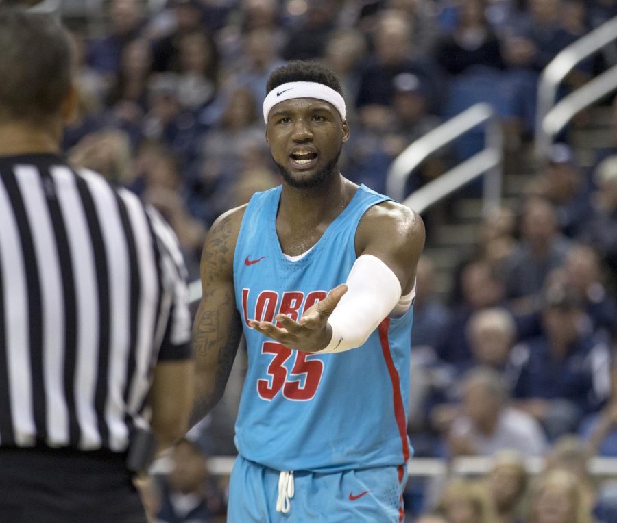 New Mexico forward Carlton Bragg (35) talks to a referee in the second half of an NCAA college basketball game against Nevada in the second half of an NCAA college basketball game in Reno, Nev., Saturday, Feb. 9, 2019. (AP Photo/Tom R. Smedes)
