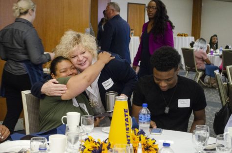 Incoming Provost Melody Tankersley hugs the mother of scholarship recipient Zethran “Z” Jackson during the watch party held on the third floor of the student center.