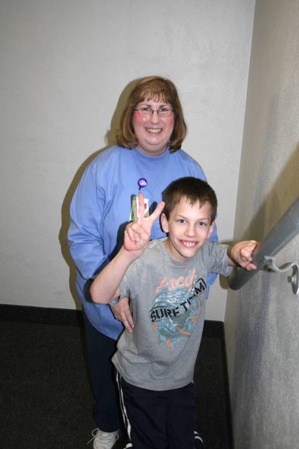 Kathy Lewis and I walking up the stairs during my last therapy visit.