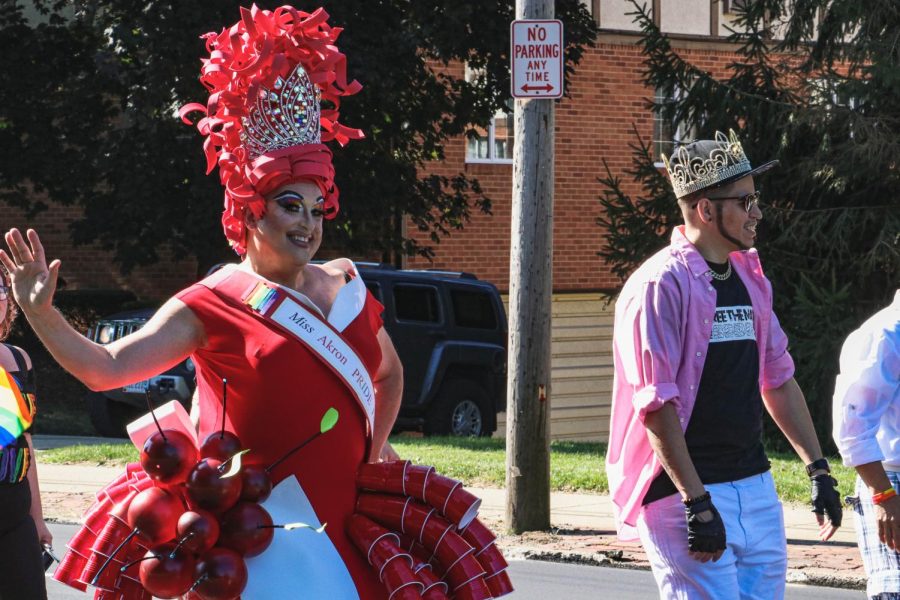 Miss Akron, the winner of APF Drag Battle, walks in the Akron Pride Parade waving to the spectators on Aug. 24, 2019.