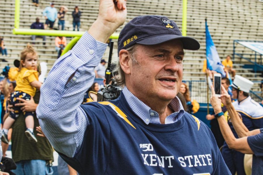 Kent State President Todd Diacon runs onto the field prior to the football home opener against Kennesaw State on September 7, 2019.