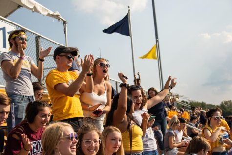 Fans in the student section celebrating after Dustin Crums 53-yard touchdown pass in the first quarter.