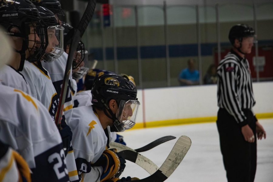 Nathaniel Schwartz watches from the bench as the Flashes face off against the Pittsburgh panthers at the Kent State Ice Arena. Kent lost 5-2. Sep 28, 2019