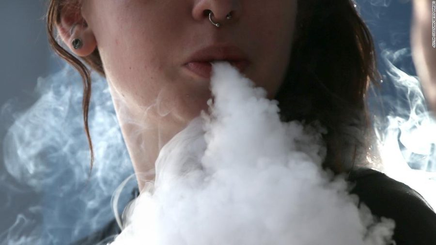 A sixth person in the United States has died from lung disease related to vaping, Kansas health officials said. The death marks the first in the state, but raises even more concern about the safety and regulation of e-cigarettes.