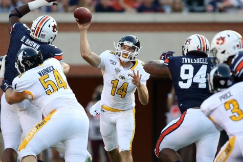 Dustin Crum attempts a pass during Saturdays 55-16 loss at No. 8 Auburn. Crum finished with a career-high 198 passing yards.