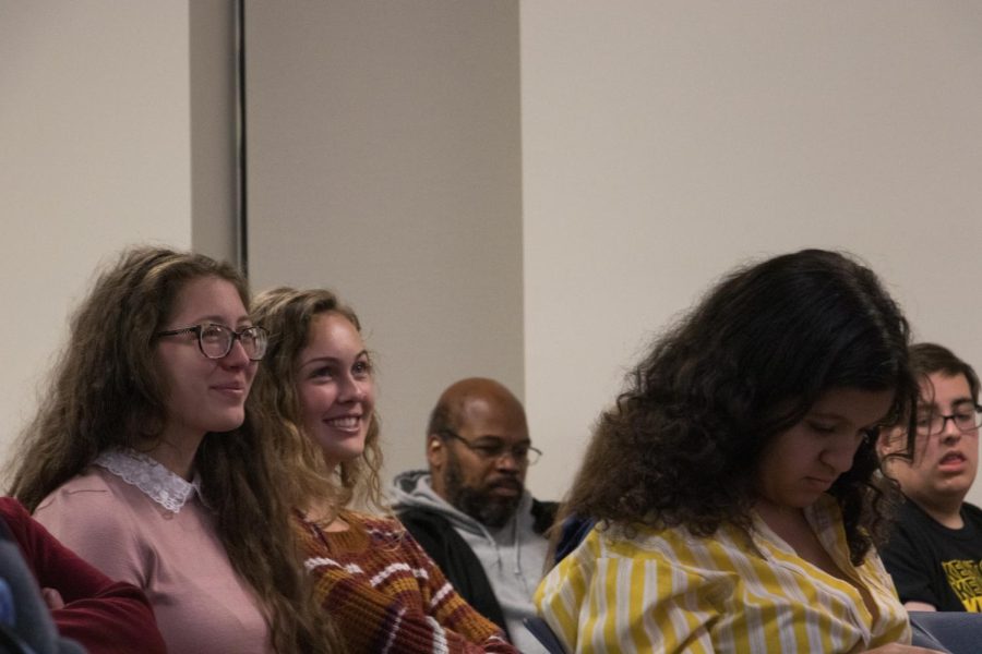 Devin Douglas (left) and Elizabeth Boerner (right) Watch the Democratic Debate in the Student Center. Oct 15, 2019