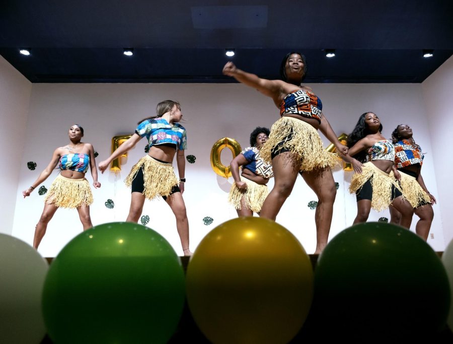 Asé Expressions, a dance troupe, performs at the beginning of the Kent African Students Association-sponsored Faces of Africa pageant in the Kiva Auditorium on Friday, Oct. 18, 2019.
