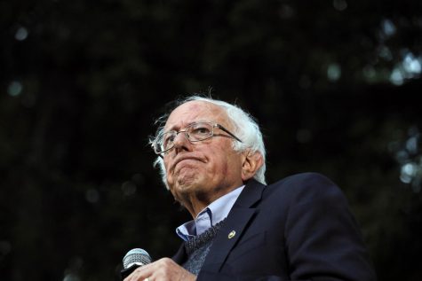 Sen. Bernie Sanders experienced chest discomfort and will suspend campaigning until further notice after doctors treated a blockage in an artery, senior adviser Jeff Weaver said in a statement.
