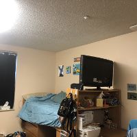 Mark used limited decor to decorate her residence hall room.