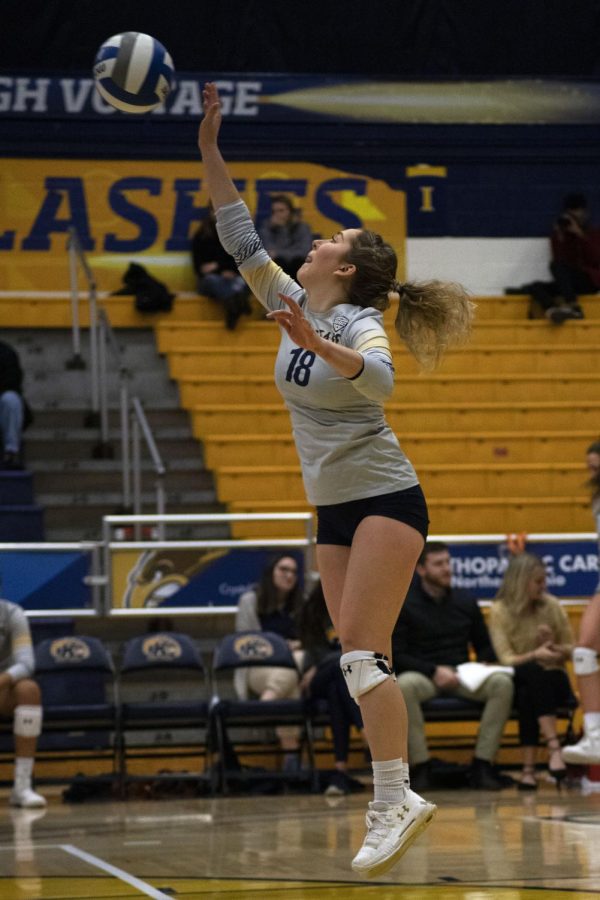 Defensive specialist Kaeleigh Stang, 18, serves the ball into play during the womens volleyball game on Nov. 15, 2019. The Golden Flashes won 3-0 against University of Akron.