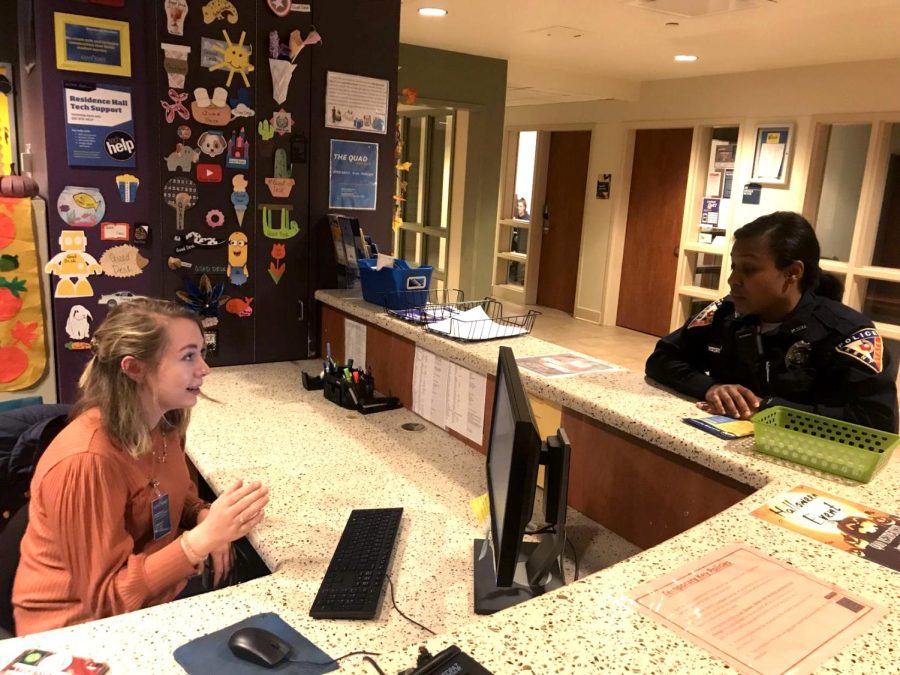 Gracen Gerbig, a senior biology major, works at the Quad Desk for Lake, Olson, Stopher and Johnson residents on Oct.31, 2019. 
