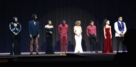 Contestants, from left to right, Sydney Evans, William Barrett, Lar’jae Cohen, Trinity Tyler, Latrice Johnson, Paul Jetter, Kristal Moseley and Cj Owensby waiting hand in hand, waiting for the judges decision of king and queen.