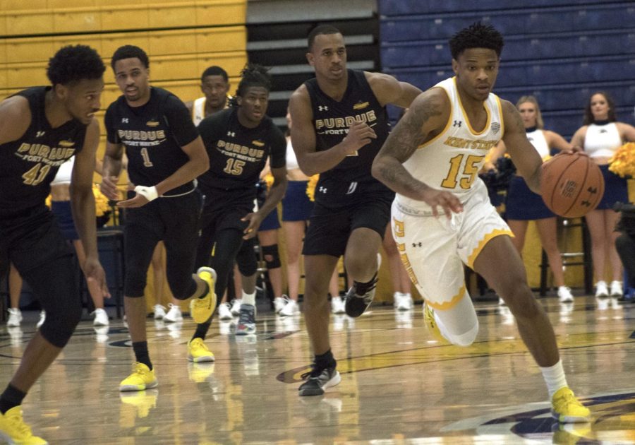 Sophomore guard Anthony Roberts (15) dribbles the ball down the court. Kent State beat Purdue Fort Wayne University 75-68 on Nov. 19, 2019.