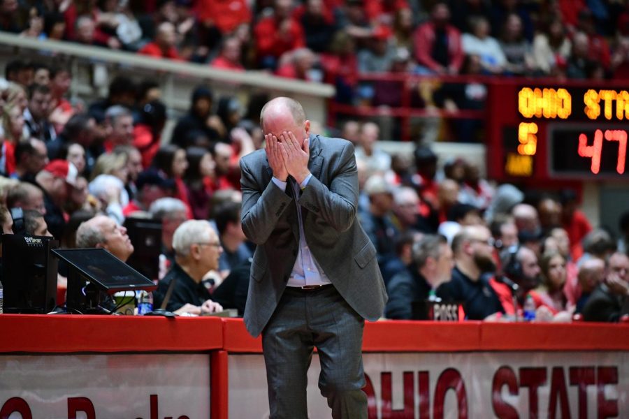 Kent State coach Rob Senderoff covers his face during Kent States 71-52 loss at Ohio State on Nov. 25.