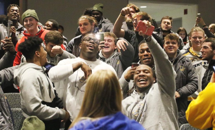 The Kent State football team celebrates after hearing they will be going to Frisco, Texas to play in the Tropical Smoothie Cafe Frisco bowl. 