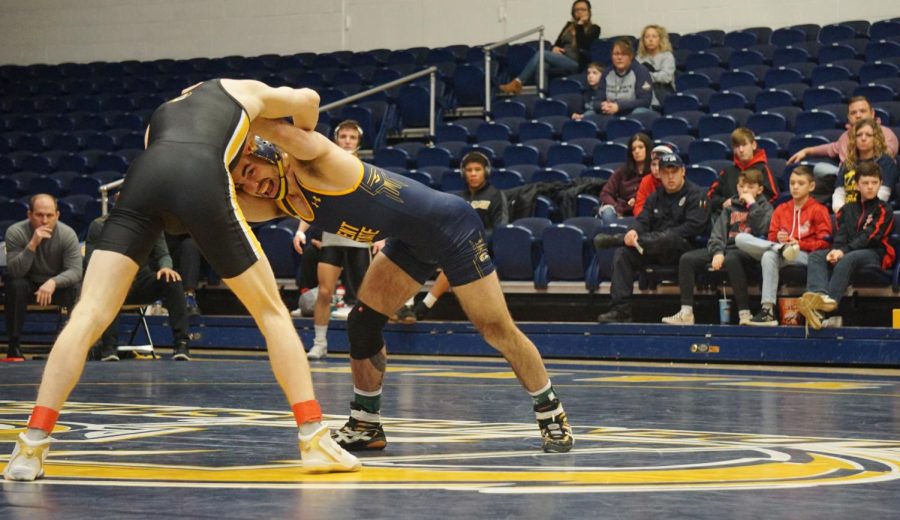 Fifth year senior Tim Rooney of Kent State grapples with Missouris Allan Hart in the 133-lb. match at the M.A.C.C. on Jan. 19, 2020. 