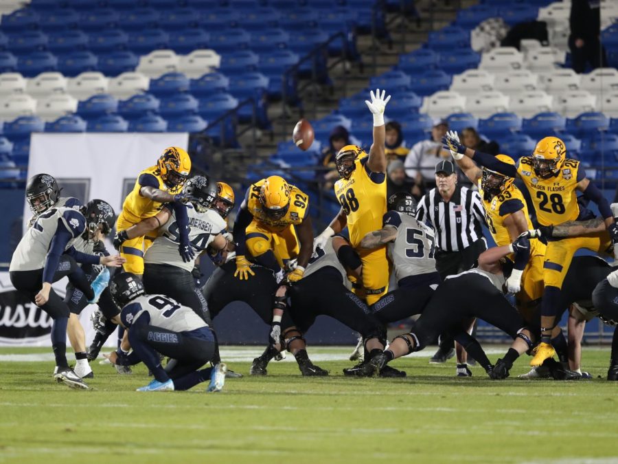 The Flashes attempt to block a field goal by Utah State on Friday Dec.20th, 2019. 