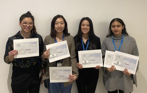 From left to right, Ann-Sophie Côté, Kory Lui, Kasie Lung and Safia Sheikh pose with their awards after a successful weekend at the Hackathon on Sunday, Jan. 26, 2020.