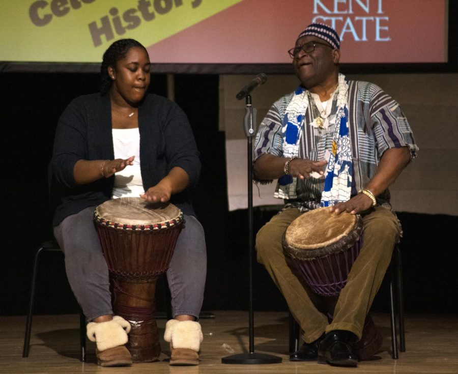 Master+drummer+David+Coleman+%28right%29+and+a+Kent+State+student+%28left%29+perform+an+African+drum+call+during+the+50th+anniversary+celebration+of+Black+History+month+on+Feb.+15%2C+2020.