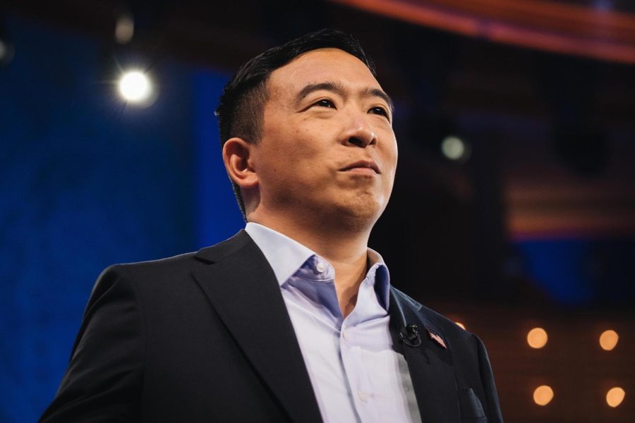 Andrew Yang, founder of Venture for America and 2020 Democratic presidential candidate, stands on stage during the Democratic presidential candidate debate in Miami, Florida, U.S., on Thursday, June 27, 2019. Former U.S. Vice President Joe Biden opened the second night of the Democratic presidential debates with a direct attack on President Donald Trump's handling of the economy, setting the tone for a night in which he and nine other hopefuls sought to demonstrate for voters the stark choice they will have in the 2020 election. Photographer: Jayme Gershen/Bloomberg via Getty Images