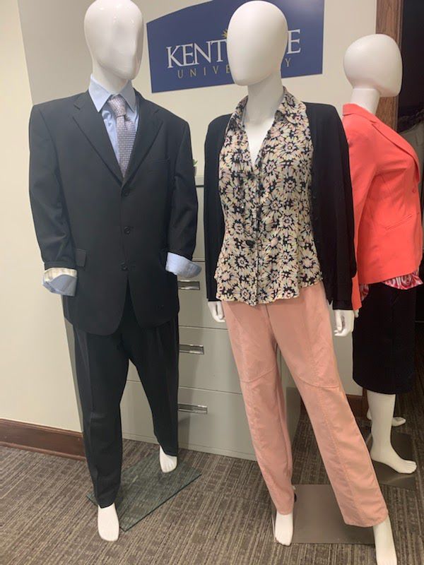 Mannequins show some clothing offered at The Career Closet. 