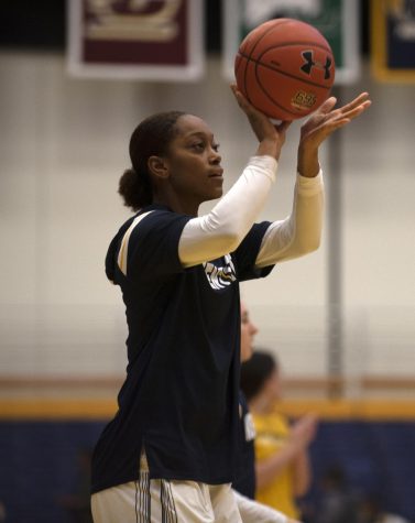 Freshman Nila Blackford (4) warms up before game starts against Bowling Green State University on Wed. Feb. 5, 2020. Kent State University won 61-47 against Bowling Green State University.