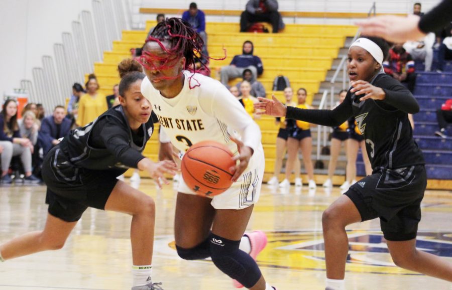 Sophomore Asiah Dingle (3) on a fast break to the hoop against Akron on Wed. Feb. 26, 2020. Kent State won 68-50 over the University of Akron.