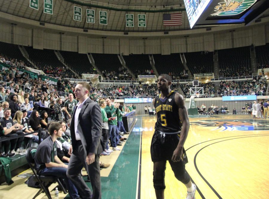 Junior forward Danny Pippen [5] walks off the court after being ejected with five minutes left in the game at the M.A.C.C. against Ohio University on Feb. 28. Kent State lost 76-69.