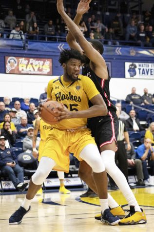 Senior forward Philip Whittington (25) attempts to make a shot during the mens basketball game on Feb. 4, 2020 against Ball State. Kent State lost 62-54. Whittington scored a game-high 18 points on 7-for-10 shooting.